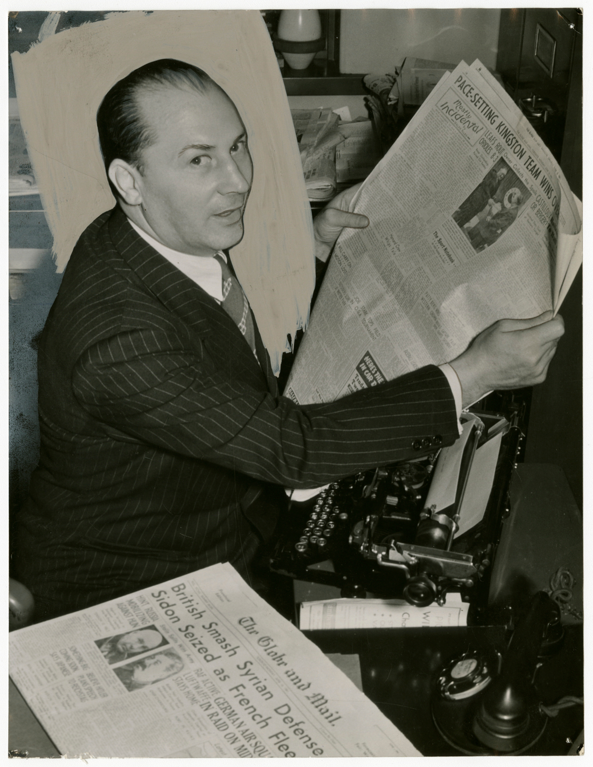     Unidentified photographer, Boxing great Benny Leonard reading The Globe and Mail sports section, c. 1945. Gelatin silver print, 9 × 6.5&#8243;. Gift of The Globe and Mail newspaper to the Canadian Photography Institute of the National Gallery of Canada.

