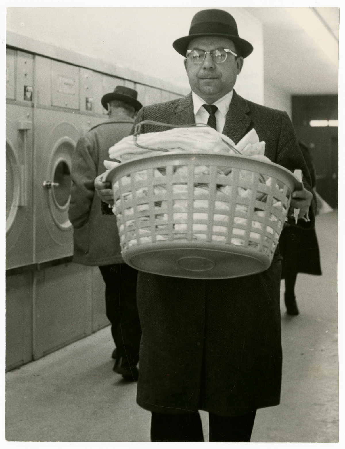     Erik Christensen (formerly known as Erik Schack), Laundromat, 1960. Gelatin silver print, 9 x 7&#8243;. Gift of The Globe and Mail newspaper to the Canadian Photography Institute of the National Gallery of Canada.


