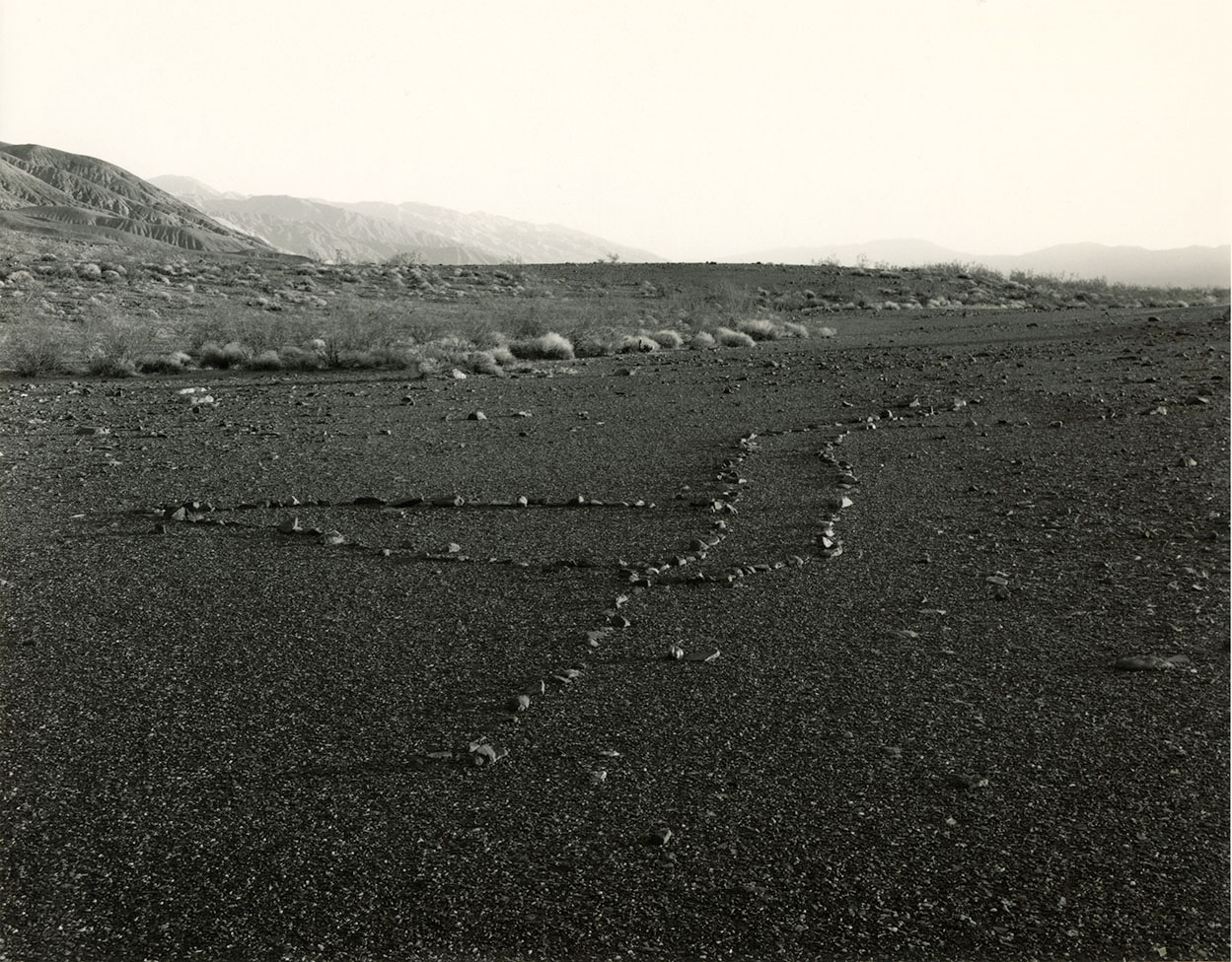     Mark Ruwedel, Panamint Valley: An Ancient Rock Alignment, 2000 Courtesy of the artist, Gallery Luisotti and Art 45 

